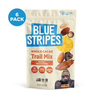 Packaging of Blue Stripes Whole Cacao Trail Mix, Mango Macadamia flavor, with 6 pack label